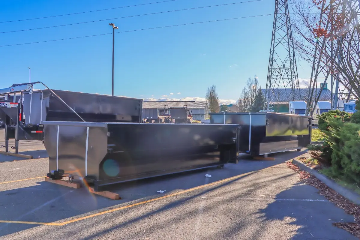 Roll-off dumpster ready for waste disposal at job site for Yard Waste Dumpster Rental in Ormond Beach